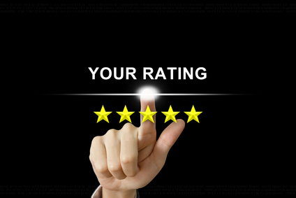 business hand pushing your rating on screen